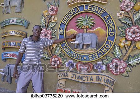 "Tour guide standing at the Sierra Leone Peace and Cultural Monument, Freetown, Sierra Leone, Africa" View Large Photo Image Stock Image - "Tour guide standing at the Sierra Leone Peace and Cultural Monument, Freetown, Sierra Leone, Africa". Fotosearch