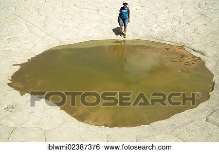 "Tourist at White Pocket water pocket, eroded Navajo sandstone rocks, Pahreah Paria Plateau, Vermilion Cliffs National Monument, Arizona, Utah, Southwest, United States of America, USA" View Large Photo Image Stock Photograph - "Tourist at White Pocket water pocket, eroded Navajo sandstone rocks, Pahreah Paria Plateau, Vermilion Cliffs National Monument, Arizona, Utah, Southwest, United States of America, USA". Fotosearch