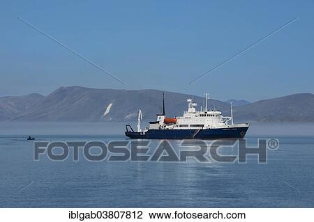 "Tourist boat anchored in front of Yttygran Island, Chukotka, Russia, Europe" View Large Photo Image Stock Image - "Tourist boat anchored in front of Yttygran Island, Chukotka, Russia, Europe". Fotosearch