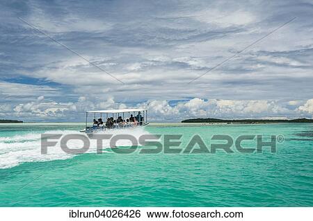 "Tourist boat crossing an artificial canal, Rock Islands, Palau, Micronesia, Oceania" View Large Photo Image Stock Photograph - "Tourist boat crossing an artificial canal, Rock Islands, Palau, Micronesia, Oceania". Fotosearch