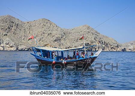 "Tourist boat in form of a dhow, Khor Ash Sham fjord, Musandam, Oman, Asia" View Large Photo Image Stock Photograph - "Tourist boat in form of a dhow, Khor Ash Sham fjord, Musandam, Oman, Asia". Fotosearch