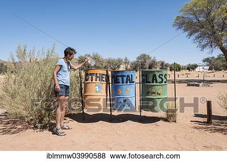 "Tourist disposing of rubbish on a campsite, waste separation, Sesriem, Namibia, Africa" View Large Photo Image Stock Photo - "Tourist disposing of rubbish on a campsite, waste separation, Sesriem, Namibia, Africa". Fotosearch
