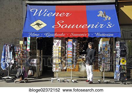 "Tourist in front of a store with postcards and souvenirs, Vienna, Austria, Europe" View Large Photo Image Stock Image - "Tourist in front of a store with postcards and souvenirs, Vienna, Austria, Europe". Fotosearch