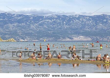 "Tourists at the beach of San Marino, Lopar, Rab, Primorje-Gorski Kotar County, Croatia, Europe" View Large Photo Image Stock Photo - "Tourists at the beach of San Marino, Lopar, Rab, Primorje-Gorski Kotar County, Croatia, Europe". Fotosearch