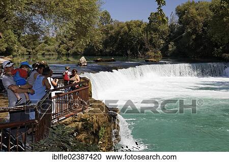"Tourists at the waterfall on the Manavgat river in the town of Manavgat, Antalya, Turkish Riviera, Turkey, Asia" View Large Photo Image Stock Image - "Tourists at the waterfall on the Manavgat river in the town of Manavgat, Antalya, Turkish Riviera, Turkey, Asia". Fotosearch