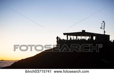 "Tourists awaiting the sunrise on the summit of the Haleakala volcano, Haleakala National Park, Maui, Hawaii, USA" View Large Photo Image Stock Image - "Tourists awaiting the sunrise on the summit of the Haleakala volcano, Haleakala National Park, Maui, Hawaii, USA". Fotosearch