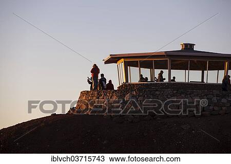 "Tourists awaiting the sunrise on the summit of the Haleakala volcano, Haleakala National Park, Maui, Hawaii, USA" View Large Photo Image Stock Image - "Tourists awaiting the sunrise on the summit of the Haleakala volcano, Haleakala National Park, Maui, Hawaii, USA". Fotosearch
