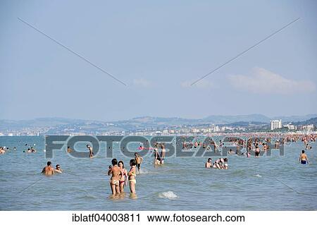 "Tourists bathing in the sea, town of Ancona at the back, Senigallia, Province of Ancona, Marche, Italy, Europe" View Large Photo Image Stock Image - "Tourists bathing in the sea, town of Ancona at the back, Senigallia, Province of Ancona, Marche, Italy, Europe". Fotosearch