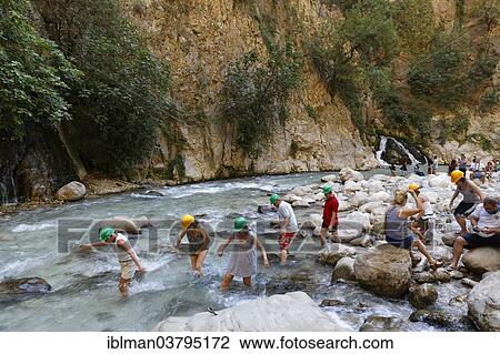 "Tourists crossing the river, Saklikent Canyon, Mugla Province, Lycia, Aegean, Turkey, Asia" View Large Photo Image Stock Image - "Tourists crossing the river, Saklikent Canyon, Mugla Province, Lycia, Aegean, Turkey, Asia". Fotosearch