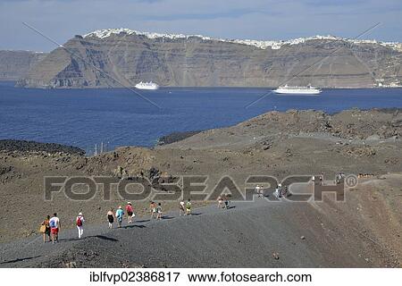 "Tourists from a cruise ship visiting the volcanic island of Nea Kameni in the Caldera, Santorini, Cyclades, Greek Islands, Greece, Europe" View Large Photo Image Stock Photo - "Tourists from a cruise ship visiting the volcanic island of Nea Kameni in the Caldera, Santorini, Cyclades, Greek Islands, Greece, Europe". Fotosearch