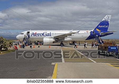 "Tourists getting off a plane of AeroGal airlines at Baltra airport island, Galapagos, Ecuador, South America" View Large Photo Image Stock Photo - "Tourists getting off a plane of AeroGal airlines at Baltra airport island, Galapagos, Ecuador, South America". Fotosearch