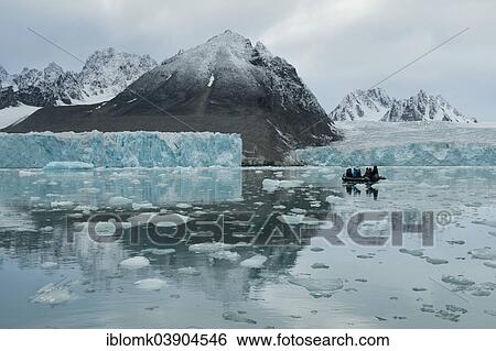 "Tourists in a rubber dinghy in front of the rim of the Monacobreen Glacier, Liefdefjorden, Spitsbergen, Svalbard Islands, Svalbard and Jan Mayen, Norway, Europe" View Large Photo Image Stock Photograph - "Tourists in a rubber dinghy in front of the rim of the Monacobreen Glacier, Liefdefjorden, Spitsbergen, Svalbard Islands, Svalbard and Jan Mayen, Norway, Europe". Fotosearch