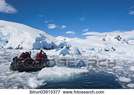 Stock Photo - "Tourists in a zodiac, Cierva Cove, Chavdar Peninsula, Antarctica". Fotosearch