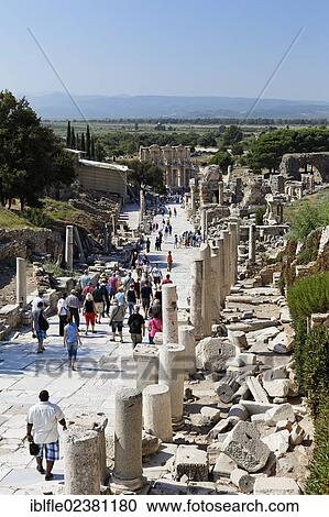 "Tourists in Ephesus, Ephesos, Efes, excavations, UNESCO World Heritage Site, view from the Curetes Street to the Library of Celsus, Izmir, Turkish Aegean, western Turkey, Turkey, Asia" View Large Photo Image Stock Image - "Tourists in Ephesus, Ephesos, Efes, excavations, UNESCO World Heritage Site, view from the Curetes Street to the Library of Celsus, Izmir, Turkish Aegean, western Turkey, Turkey, Asia". Fotosearch