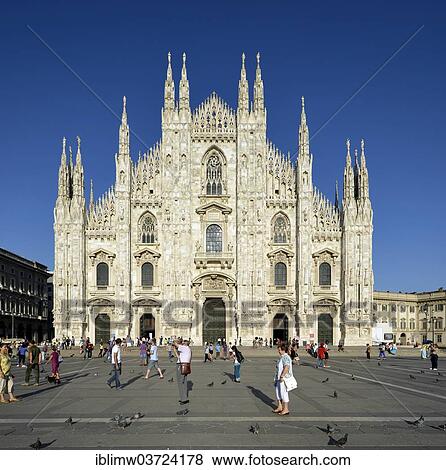 "Tourists in front of the west facade of Milan Cathedral or Duomo di Santa Maria Nascente, Milan, Lombardy, Italy, Europe" View Large Photo Image Stock Photo - "Tourists in front of the west facade of Milan Cathedral or Duomo di Santa Maria Nascente, Milan, Lombardy, Italy, Europe". Fotosearch