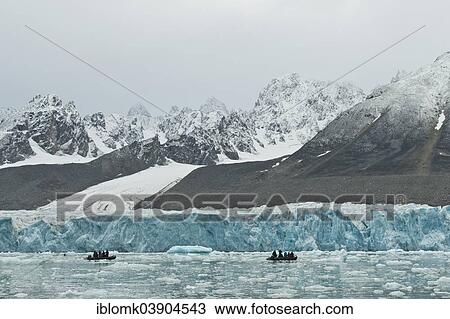 "Tourists in rubber dinghies in front of the rim of the Monacobreen Glacier, Liefdefjorden, Spitsbergen, Svalbard Islands, Svalbard and Jan Mayen, Norway, Europe" View Large Photo Image Stock Image - "Tourists in rubber dinghies in front of the rim of the Monacobreen Glacier, Liefdefjorden, Spitsbergen, Svalbard Islands, Svalbard and Jan Mayen, Norway, Europe". Fotosearch