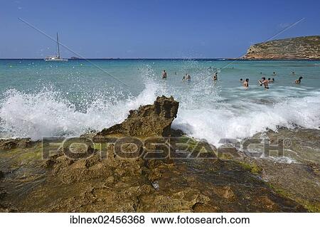 "Tourists in the water, Cala Comte, Platges de Comte, Ibiza, Pitiusic Islands or Pine Islands, Balearic Islands, Spain, Europe" View Large Photo Image Stock Photo - "Tourists in the water, Cala Comte, Platges de Comte, Ibiza, Pitiusic Islands or Pine Islands, Balearic Islands, Spain, Europe". Fotosearch