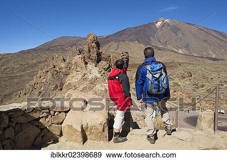 Stock Photo - "Tourists, Los Roques in Parque Nacional del Teide, Tenerife, Canary Islands, Spain, Europe". Fotosearch