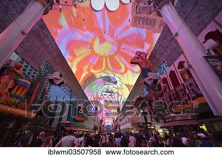 "Tourists marvelling at the laser show in the neon dome of the Fremont Street Experience in old Las Vegas, downtown, Las Vegas, Nevada, United States, North America" View Large Photo Image Stock Photo - "Tourists marvelling at the laser show in the neon dome of the Fremont Street Experience in old Las Vegas, downtown, Las Vegas, Nevada, United States, North America". Fotosearch