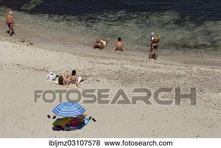 "Tourists on a sandy beach, Cala Romaguera, Mallorca, Majorca, Balearic Islands, Spain, Europe" View Large Photo Image Stock Photo - "Tourists on a sandy beach, Cala Romaguera, Mallorca, Majorca, Balearic Islands, Spain, Europe". Fotosearch