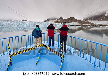 "Tourists on an expedition ship, Smeerenburg Glacier, Spitsbergen Island, Svalbard Archipelago, Svalbard and Jan Mayen, Norway, Europe" View Large Photo Image Stock Photo - "Tourists on an expedition ship, Smeerenburg Glacier, Spitsbergen Island, Svalbard Archipelago, Svalbard and Jan Mayen, Norway, Europe". Fotosearch