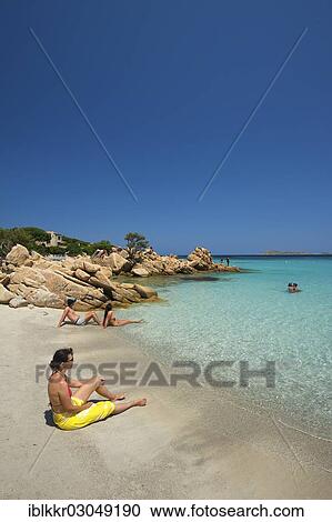 Stock Image - "Tourists on Capriccioli Beach, Costa Smeralda, Sardinia, Italy, Europe". Fotosearch