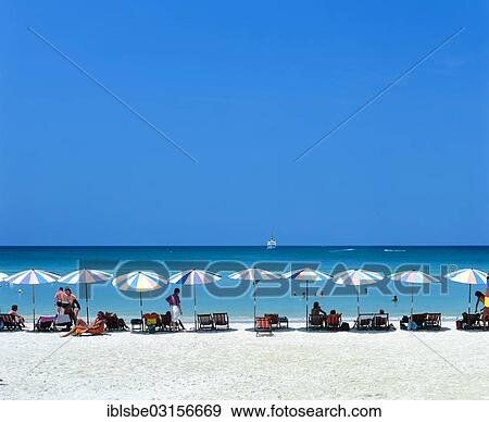 "Tourists on Patong Beach with sunshades and beach chairs, Andaman Sea, Phuket, Phuket Province, Thailand, Asia" View Large Photo Image Stock Photo - "Tourists on Patong Beach with sunshades and beach chairs, Andaman Sea, Phuket, Phuket Province, Thailand, Asia". Fotosearch