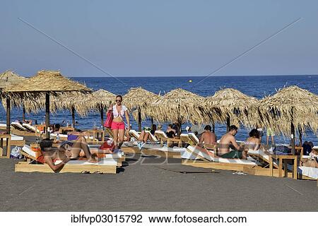 "Tourists on Perivolos Beach near Perivolos, Perivolos, Santorin, Cyclades, Greece, Europe" View Large Photo Image Stock Image - "Tourists on Perivolos Beach near Perivolos, Perivolos, Santorin, Cyclades, Greece, Europe". Fotosearch