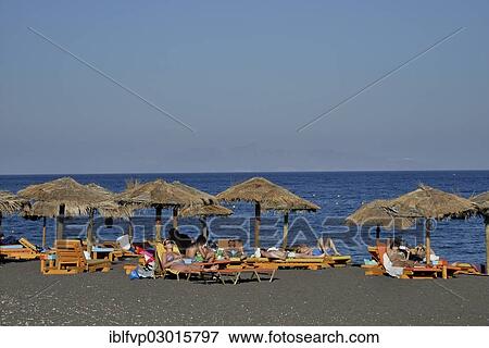 "Tourists on Perivolos Beach near Perivolos, Perivolos, Santorin, Cyclades, Greece, Europe" View Large Photo Image Stock Photo - "Tourists on Perivolos Beach near Perivolos, Perivolos, Santorin, Cyclades, Greece, Europe". Fotosearch