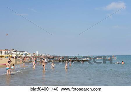 Stock Image - "Tourists on the beach, Jesolo, Veneto, Adriatic, Italy, Europe". Fotosearch