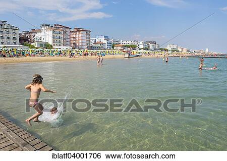 "Tourists on the beach, Jesolo, Veneto, Adriatic, Italy, Europe" View Large Photo Image Stock Photograph - "Tourists on the beach, Jesolo, Veneto, Adriatic, Italy, Europe". Fotosearch
