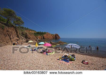 Stock Photo - "Tourists on the beach, Saint-Raphael, French Riviera, Var, Provence-Alpes-Cote d? ÇÖAzur, France, Europe". Fotosearch