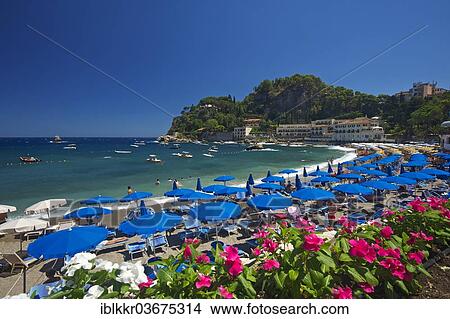 "Tourists on the beach, umbrellas and sun loungers, Bay of Mazzaro, Taormina, Province of Messina, Sicily, Italy, Europe" View Large Photo Image Picture - "Tourists on the beach, umbrellas and sun loungers, Bay of Mazzaro, Taormina, Province of Messina, Sicily, Italy, Europe". Fotosearch