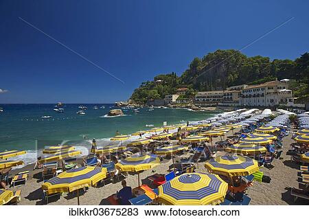 "Tourists on the beach, umbrellas and sun loungers, Bay of Mazzaro, Taormina, Province of Messina, Sicily, Italy, Europe" View Large Photo Image Stock Image - "Tourists on the beach, umbrellas and sun loungers, Bay of Mazzaro, Taormina, Province of Messina, Sicily, Italy, Europe". Fotosearch