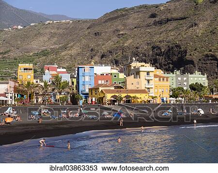 "Tourists on the black beach of Puerto de Tazacorte, La Palma, Canary Islands, Spain, Europe" View Large Photo Image Stock Image - "Tourists on the black beach of Puerto de Tazacorte, La Palma, Canary Islands, Spain, Europe". Fotosearch