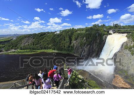 Tourists on viewing platform at Montmorency Falls, Quebec, Canada, North America View Large Photo Image Stock Image - Tourists on viewing platform at Montmorency Falls, Quebec, Canada, North America. Fotosearch
