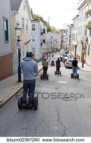 Stock Image - "Tourists riding segways in Boston, Massachusetts, USA". Fotosearch