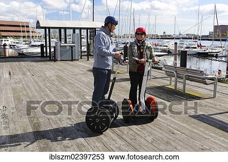 "Tourists riding segways round the port, North End of Boston, Massachusetts, USA" View Large Photo Image Stock Image - "Tourists riding segways round the port, North End of Boston, Massachusetts, USA". Fotosearch