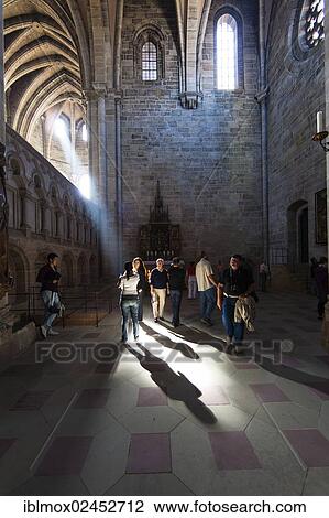 Stock Image - "Tourists standing in the sunbeam, Bamberg Cathedral, Bamberg, Upper Franconia, Bavaria, Germany, Europe, PublicGround, Europe". Fotosearch