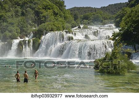 "Tourists taking a bath at the Skradinski buk waterfalls, Krka National Park, Sibenik-Knin County, Dalmatia, Croatia, Europe" View Large Photo Image Stock Photo - "Tourists taking a bath at the Skradinski buk waterfalls, Krka National Park, Sibenik-Knin County, Dalmatia, Croatia, Europe". Fotosearch