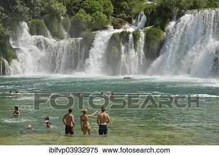 "Tourists taking a bath at the Skradinski buk waterfalls, Krka National Park, Sibenik-Knin County, Dalmatia, Croatia, Europe" View Large Photo Image Stock Photography - "Tourists taking a bath at the Skradinski buk waterfalls, Krka National Park, Sibenik-Knin County, Dalmatia, Croatia, Europe". Fotosearch