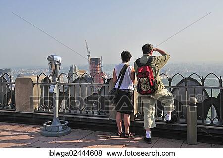 Stock Photo - "Tourists visiting the observation deck, Top of the Rock, at the Rockefeller Center, Manhattan, New York City, USA, North America". Fotosearch