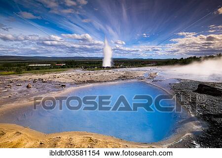 "Tourists watching the Strokkur geyser, blue hot spring at front, Haukadalur valley, Golden Circle, Southern Region, Iceland, Europe" View Large Photo Image Picture - "Tourists watching the Strokkur geyser, blue hot spring at front, Haukadalur valley, Golden Circle, Southern Region, Iceland, Europe". Fotosearch