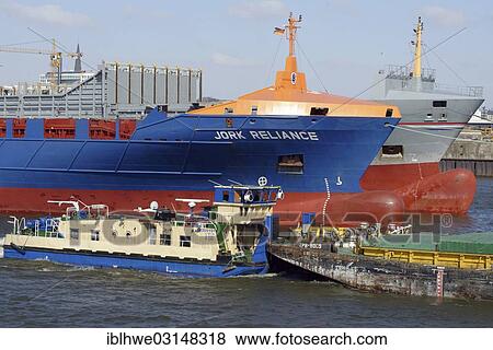 "Towboat and feeder vessel on the Norderelbe River, Hamburg, Hamburg, Hamburg, Germany, Europe" View Large Photo Image Stock Photo - "Towboat and feeder vessel on the Norderelbe River, Hamburg, Hamburg, Hamburg, Germany, Europe". Fotosearch