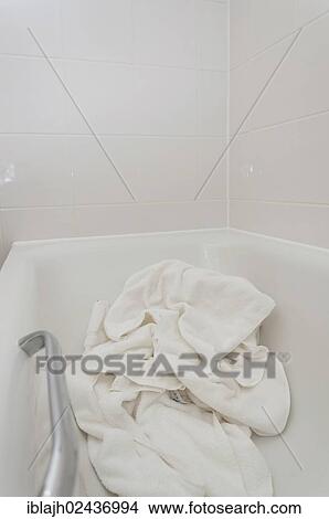 Picture - Towels left in a hotel room bath for room service to refresh. Fotosearch