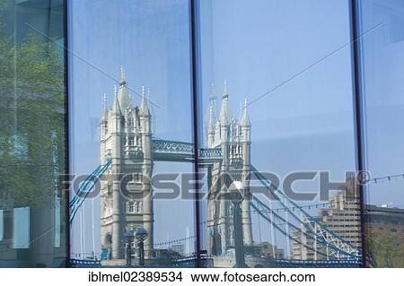 "Tower Bridge reflection in the window of Ernst & Young Building, More London Place, More London Riverside, Southwark, London, England, United Kingdom, Europe" View Large Photo Image Picture - "Tower Bridge reflection in the window of Ernst & Young Building, More London Place, More London Riverside, Southwark, London, England, United Kingdom, Europe". Fotosearch