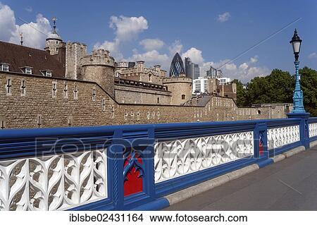 Picture - "Tower of London, railing with a lantern in front of the Swiss Re Tower, The Gherkin, London, England, United Kingdom, Europe". Fotosearch