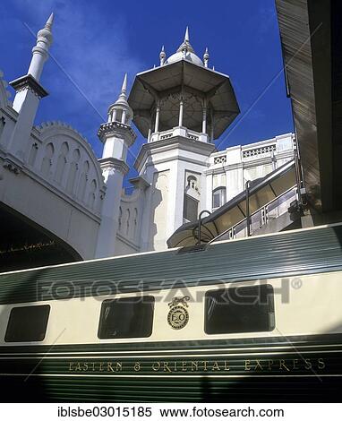 "Tower of the railway station in Kuala Lumpur built in Victorian architecture style, 1911, with a wagon of the Eastern Oriental Express, Kuala Lumpur, Malaysia, Asia" View Large Photo Image Stock Photography - "Tower of the railway station in Kuala Lumpur built in Victorian architecture style, 1911, with a wagon of the Eastern Oriental Express, Kuala Lumpur, Malaysia, Asia". Fotosearch
