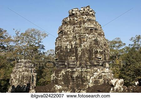 Stock Photo - Tower with a face carved in stone, Bayon Temple, Angkor Thom, Siem Reap, Cambodia, Southeast Asia, Asia. Fotosearch