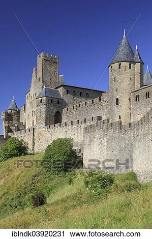 "Towers and entrance gate Port d'Aude of the medieval fortress of Carcassonne, Chateau Comtal, Cite de Carcassonne, Carcassonne, Departement Aude, Languedoc-Roussillon, France, Europe" View Large Photo Image Stock Image - "Towers and entrance gate Port d'Aude of the medieval fortress of Carcassonne, Chateau Comtal, Cite de Carcassonne, Carcassonne, Departement Aude, Languedoc-Roussillon, France, Europe". Fotosearch